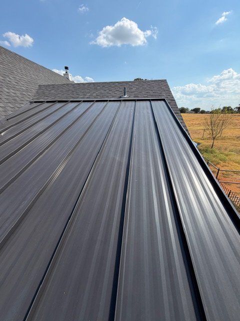 Metal roof panels after softwashing