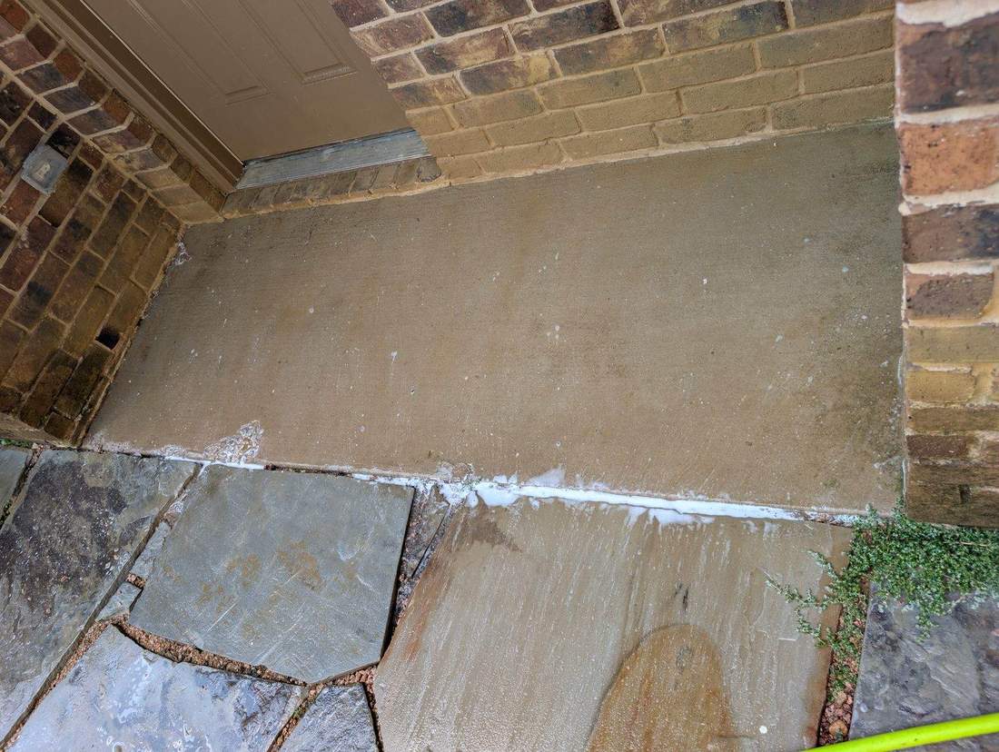 Patio entryway before softwashing